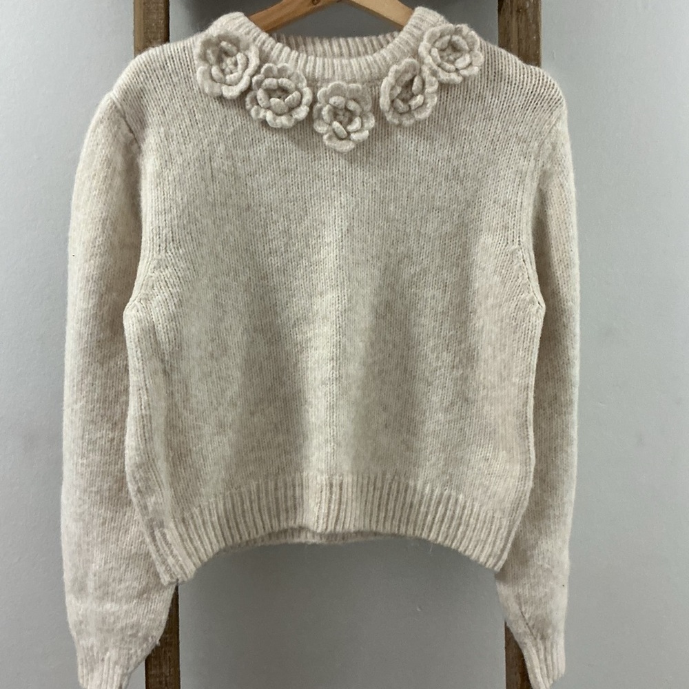 Elegant Cream Sweater with Floral Detailing
